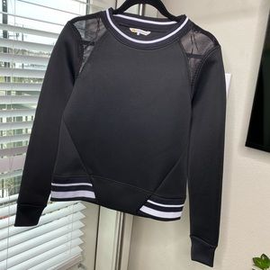 Long sleeve structured pull over with mesh shoulders